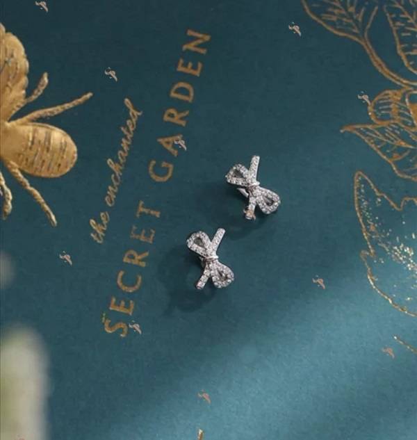 SERA 925 Silver Ribbon Knot Hoop Clip Earrings for Lady ER019